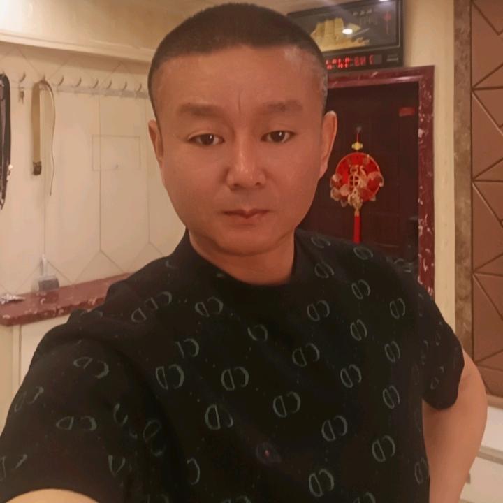 慕德强