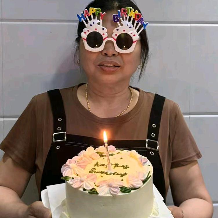 舒七英