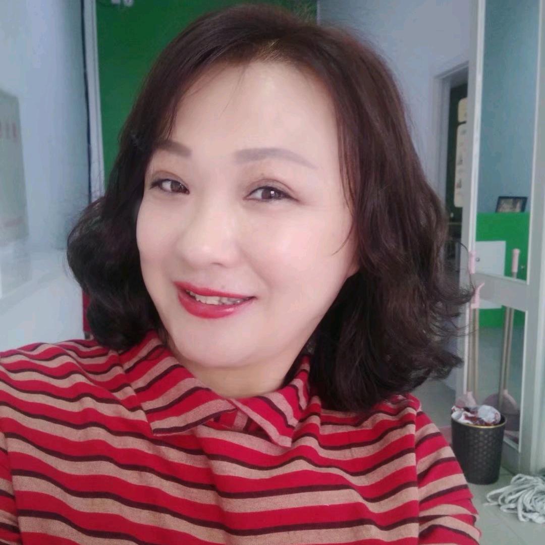 安然一笑