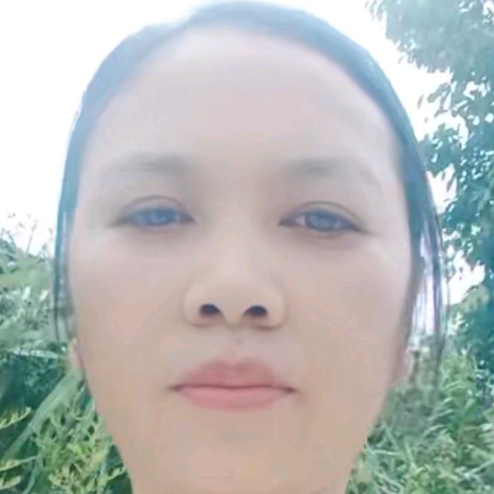 梁光美
