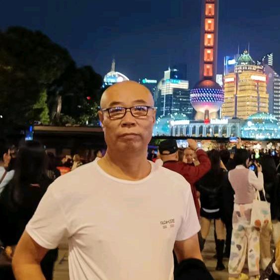 张哥.