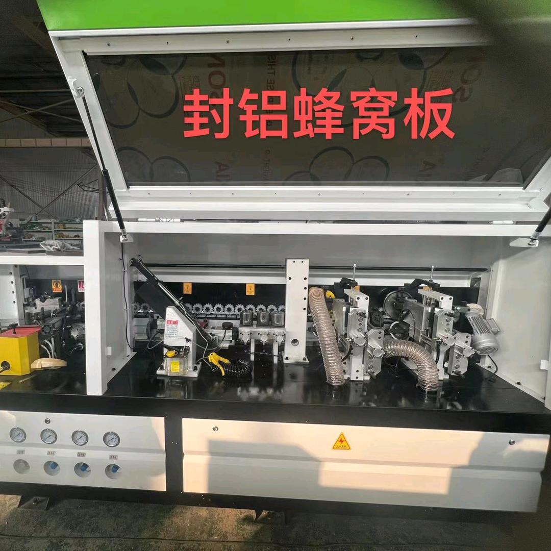 昊川软成型免拉手封边机蜂窝铝板封边机