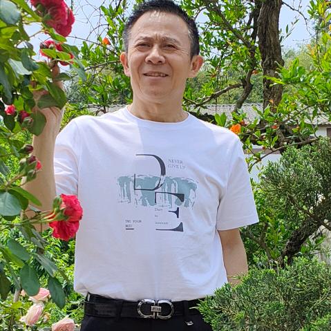 张哥.