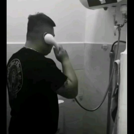 劉