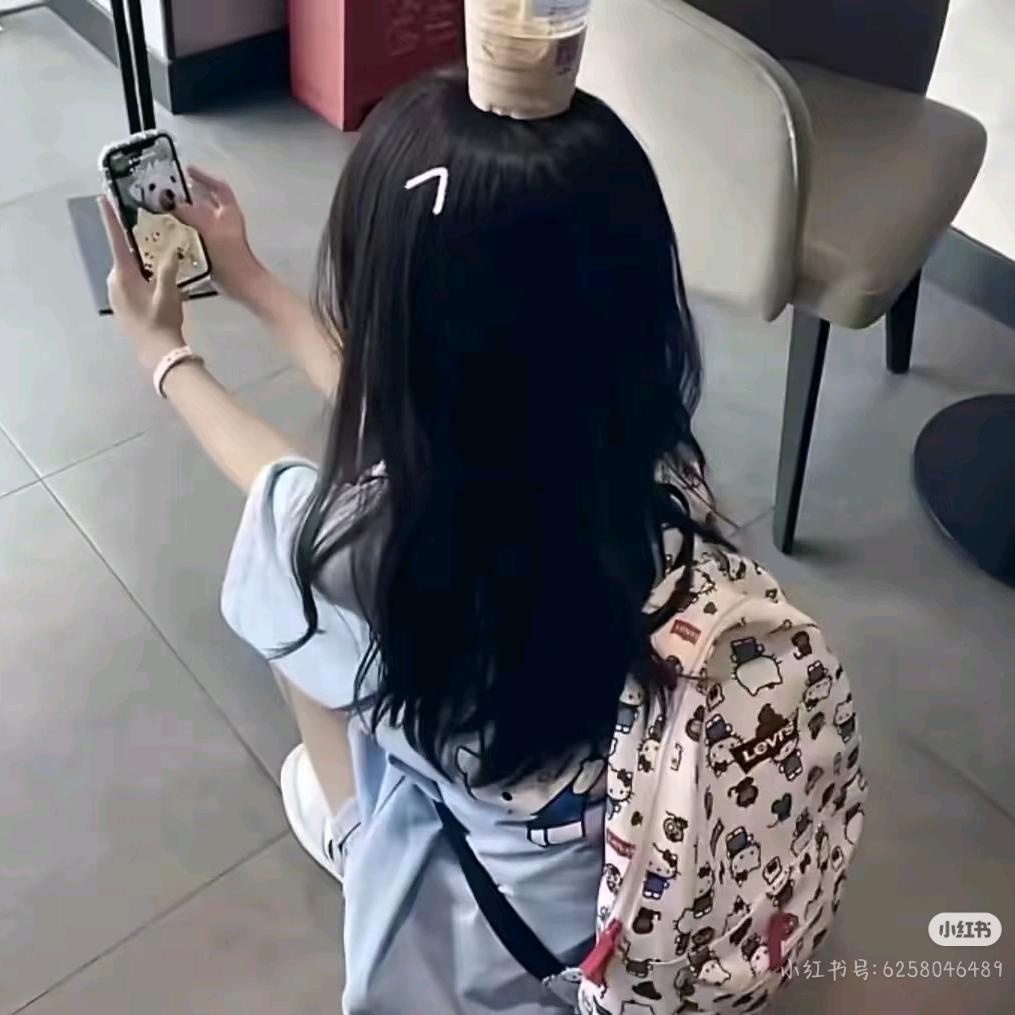 纯^