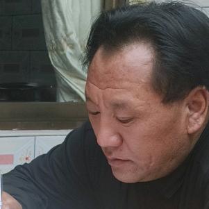 周尕