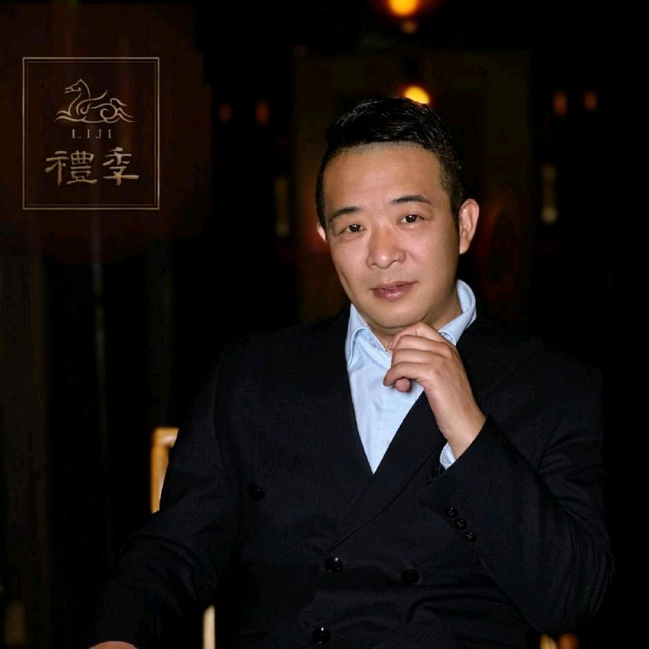 吴辉良=礼季餐饮
