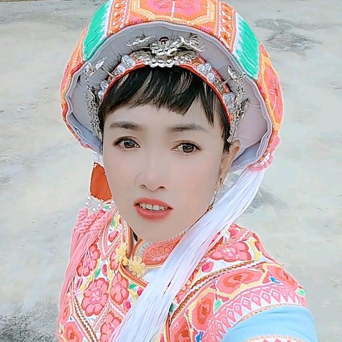 彝村巧妹