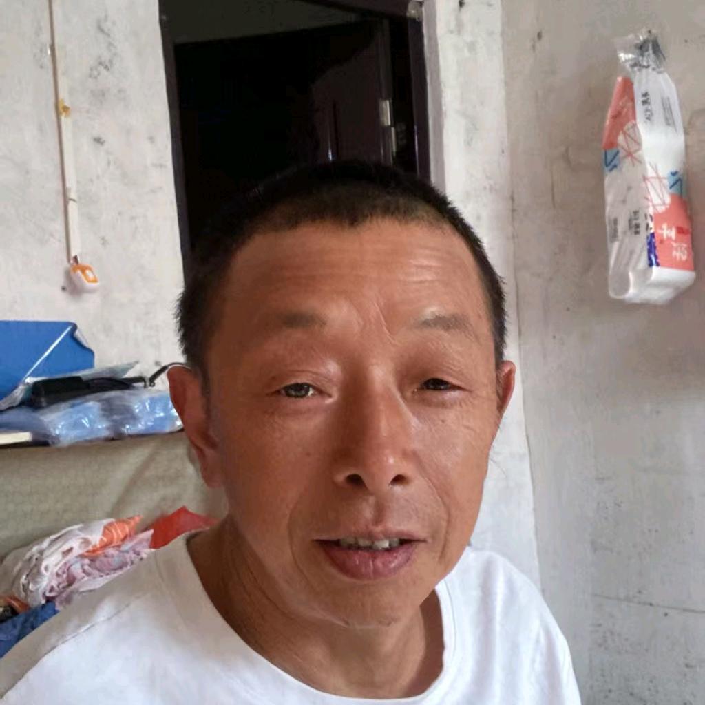 老何