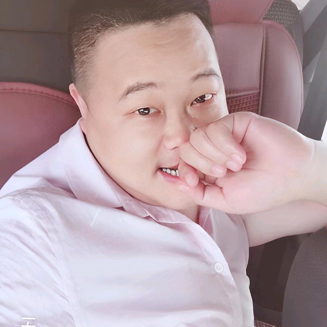汪 哥