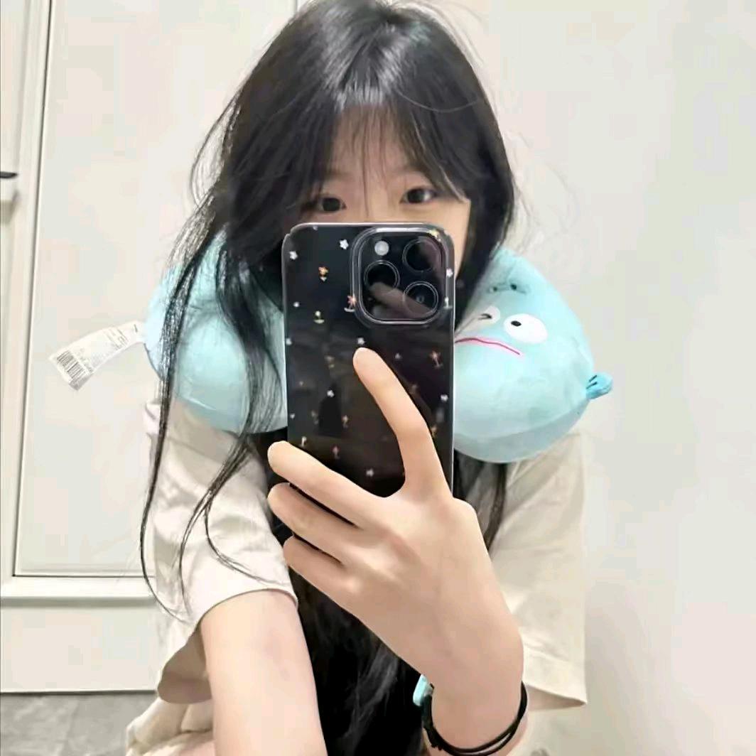T.