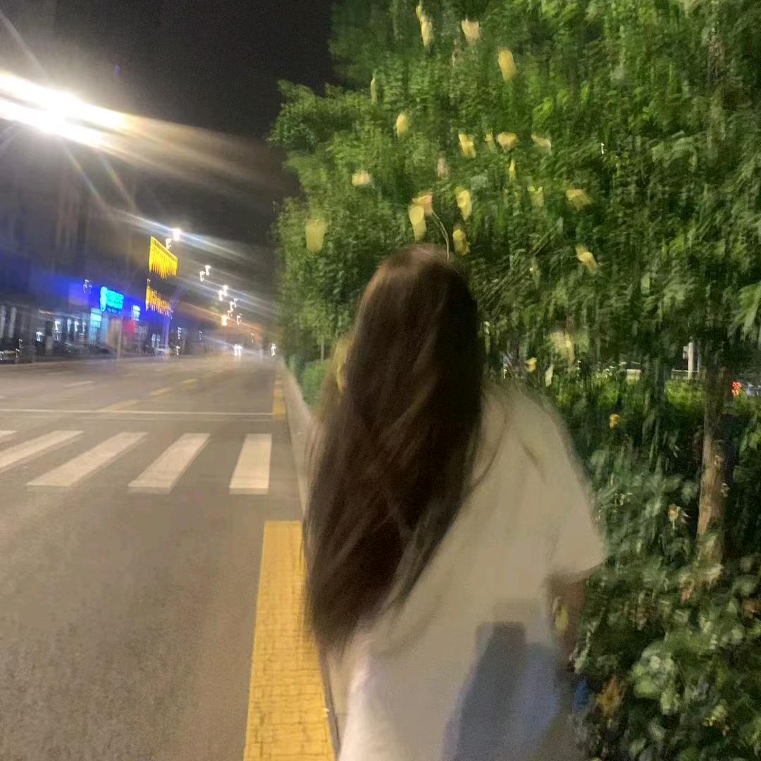 T.
