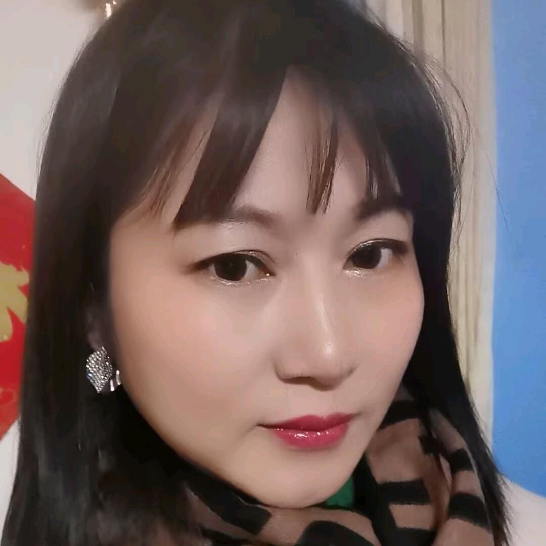 嫣然一笑