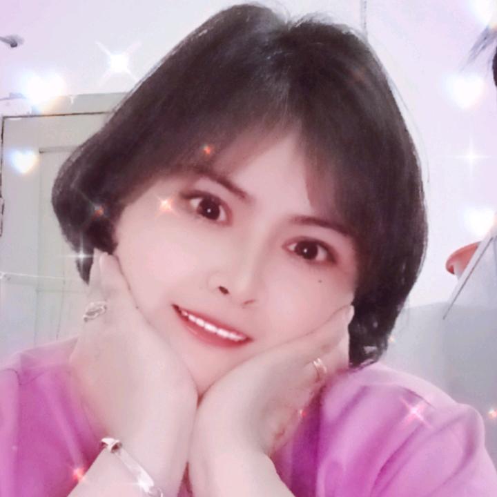 嫣然