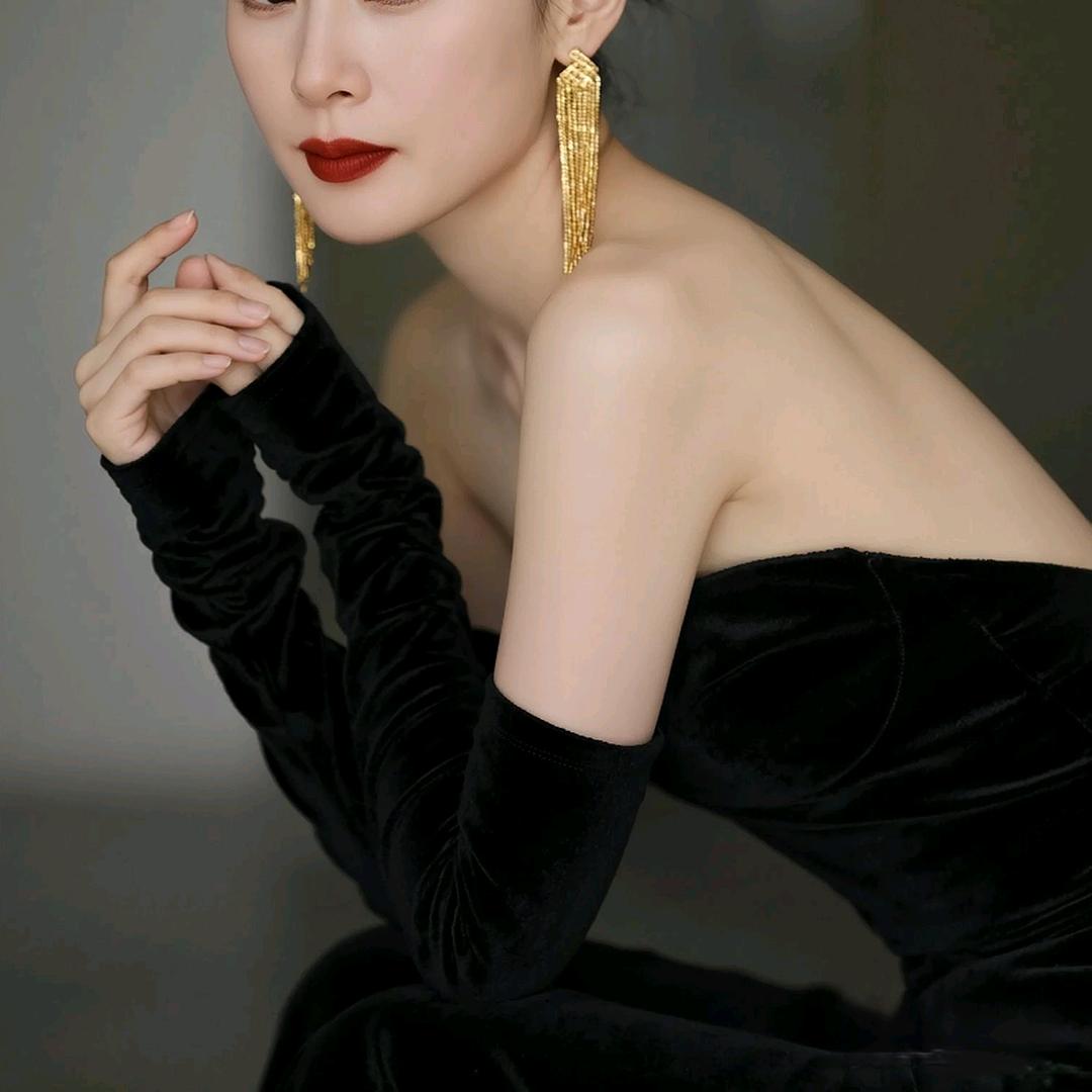 （美）