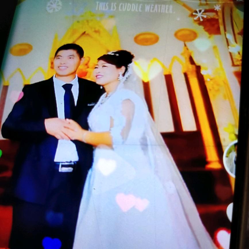梁女士