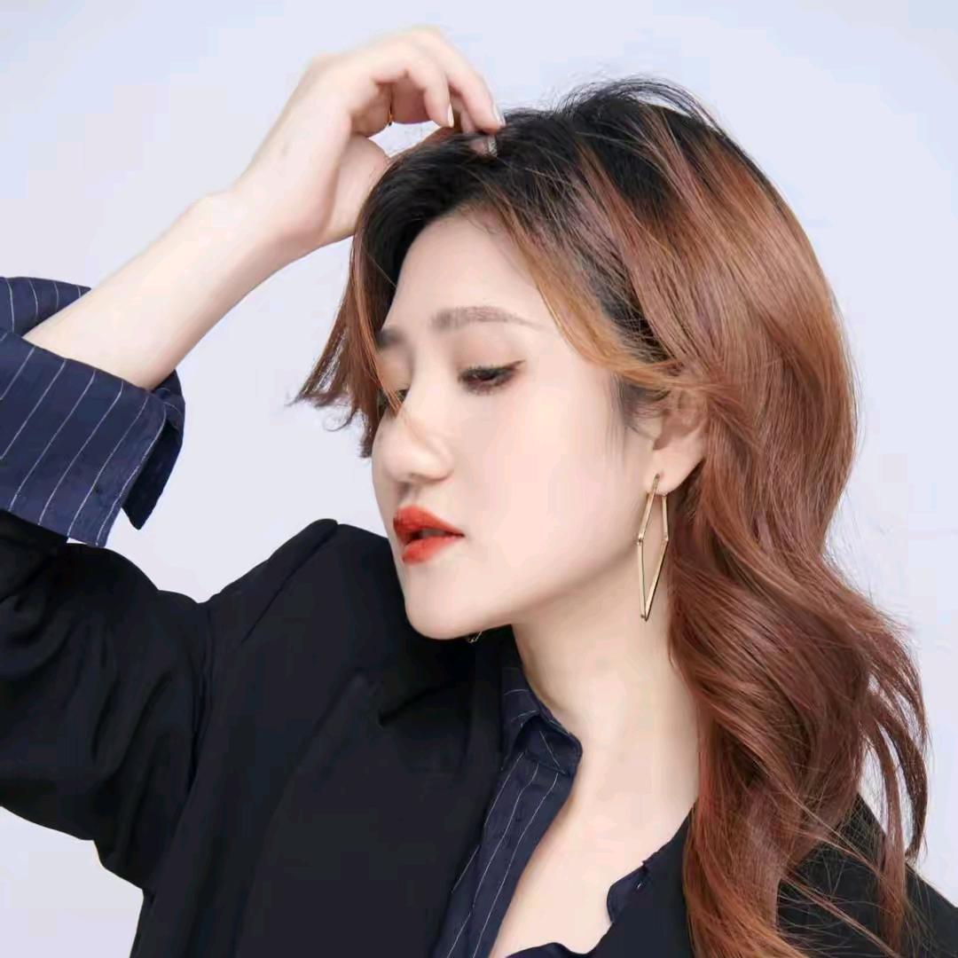 张德明