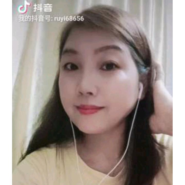 橙子.
