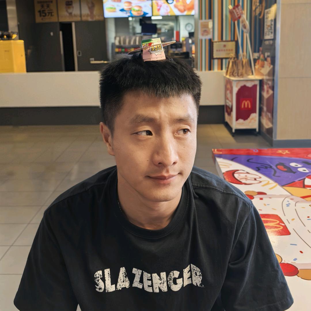 L.
