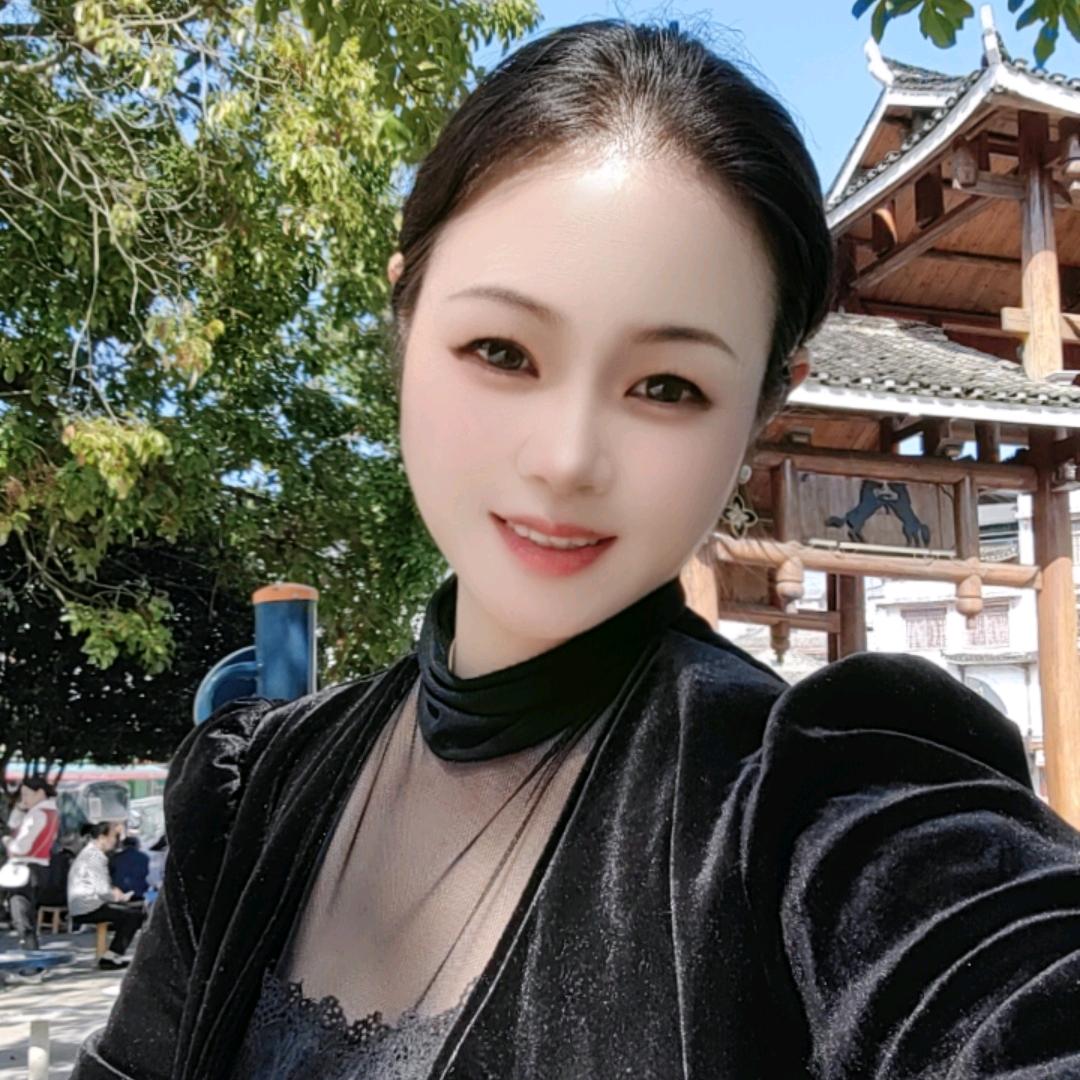 嫣然