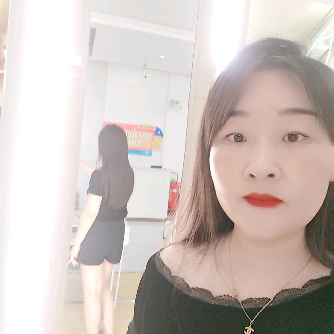 淡然一笑
