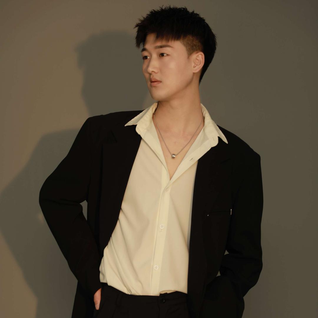 盘锦原宿烫发染发设计：晓龙