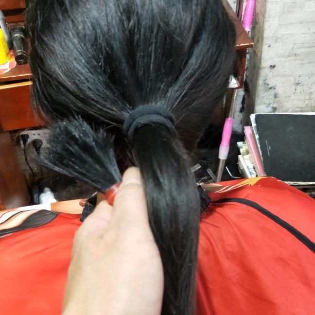 帝伦造型收长头发辫子