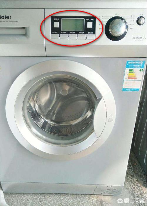 海尔全自动洗衣机洗衣中怎样把门打开，海尔全自动洗衣机怎么把门打开