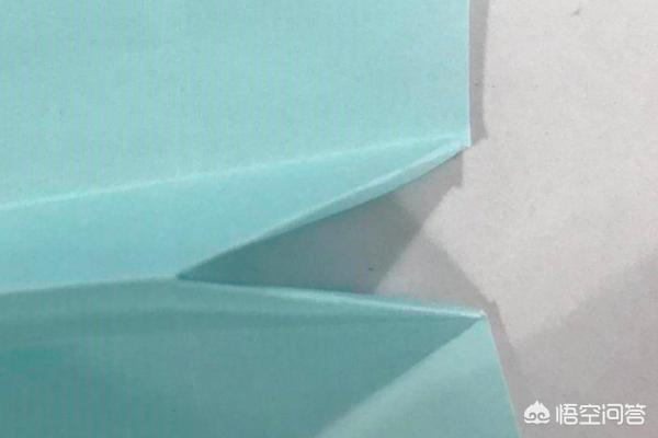 购买的折纸飞机怎么折的